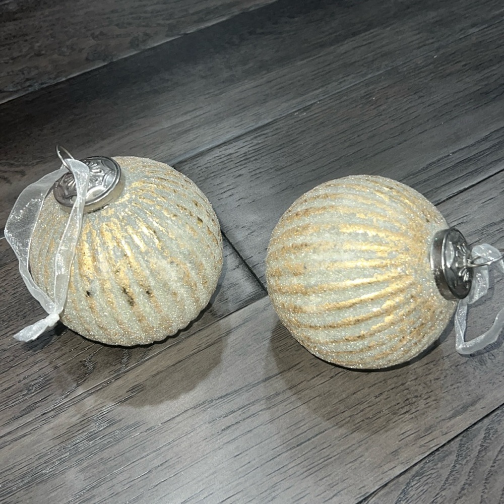 Nicole Miller fluted velvet like Christmas ornaments with a gold foil design